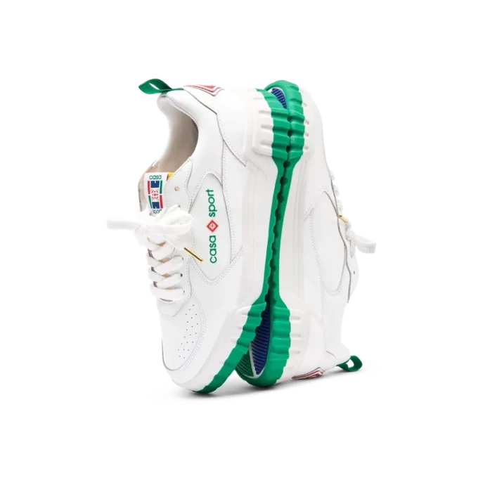 Court hvit og grønn sneaker for kvinner