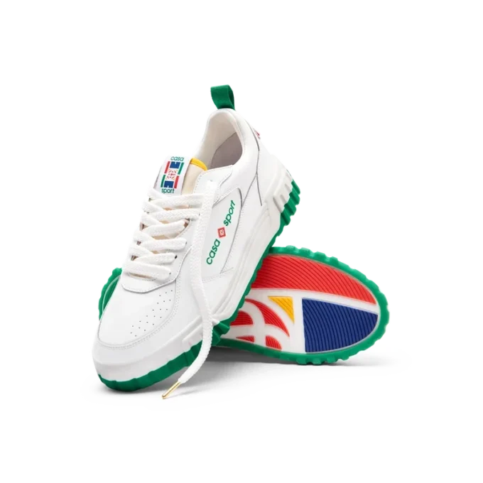 Court hvit og grønn sneaker for kvinner