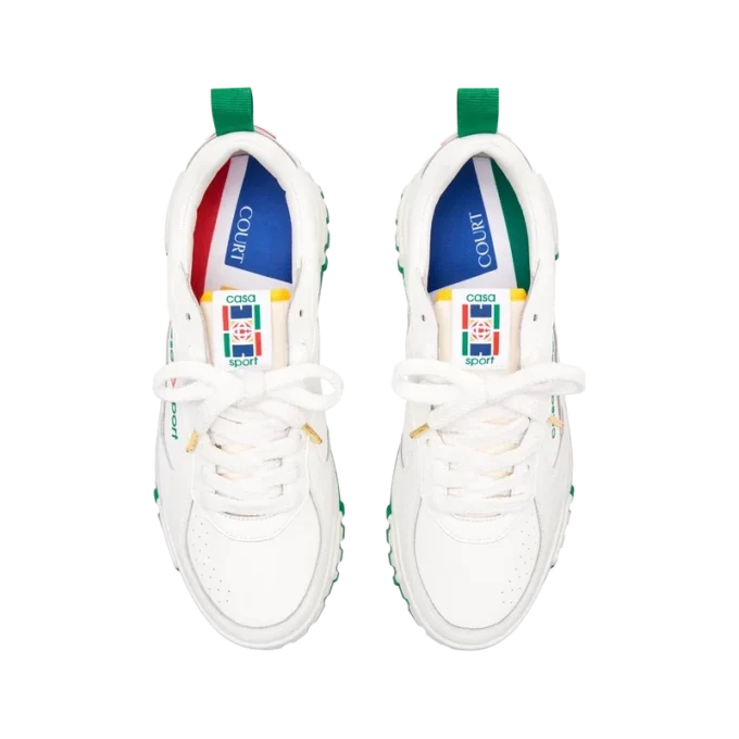 Court hvit og grønn sneaker for kvinner