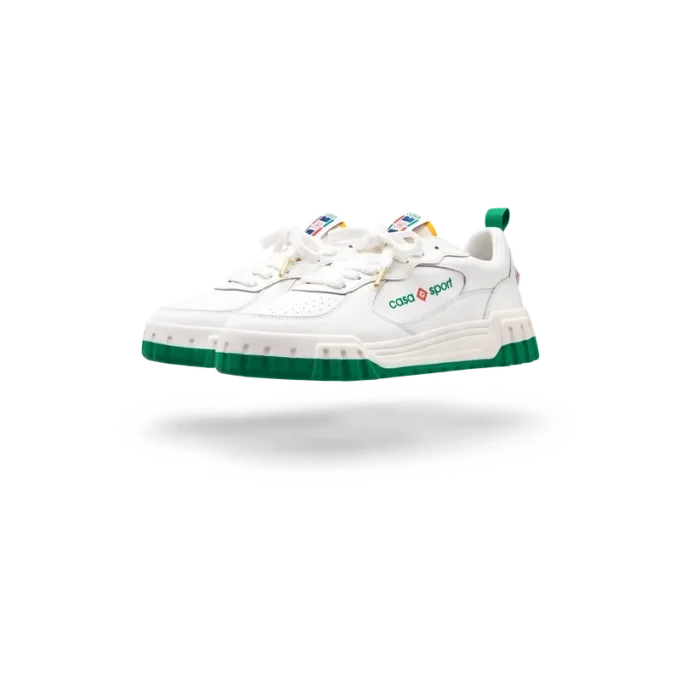 Court hvit og grønn sneaker for kvinner