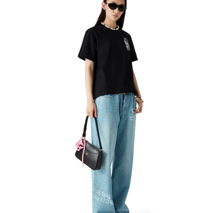 Graffiti-distressed denimjeans