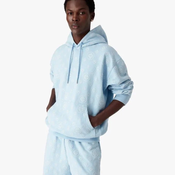 Hettegenser med applikert monogram