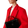 Jeanne-veske med svarte emblemer