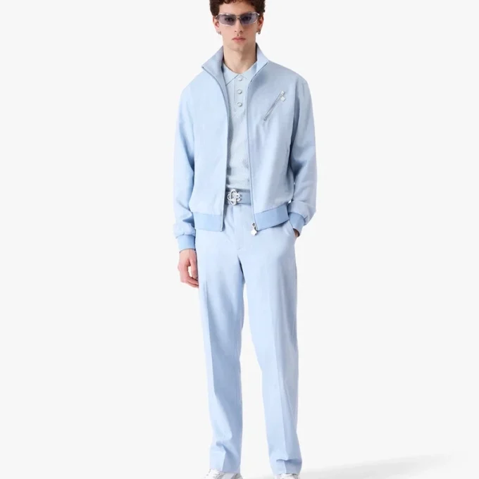 Lysblå jakke i jacquard med glidelås Lysblå jakke i jacquard med glidelås