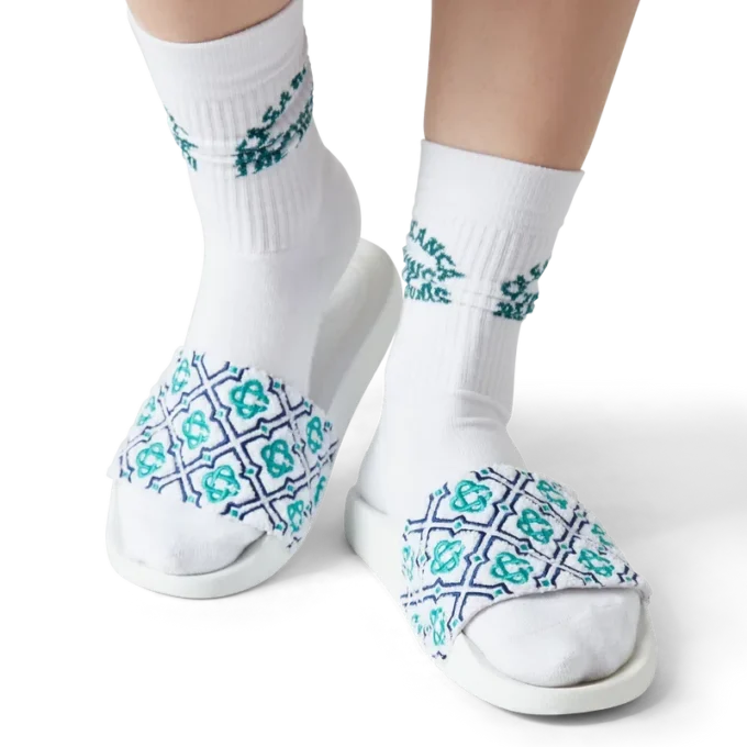 Monogram-frottéslippers for kvinner