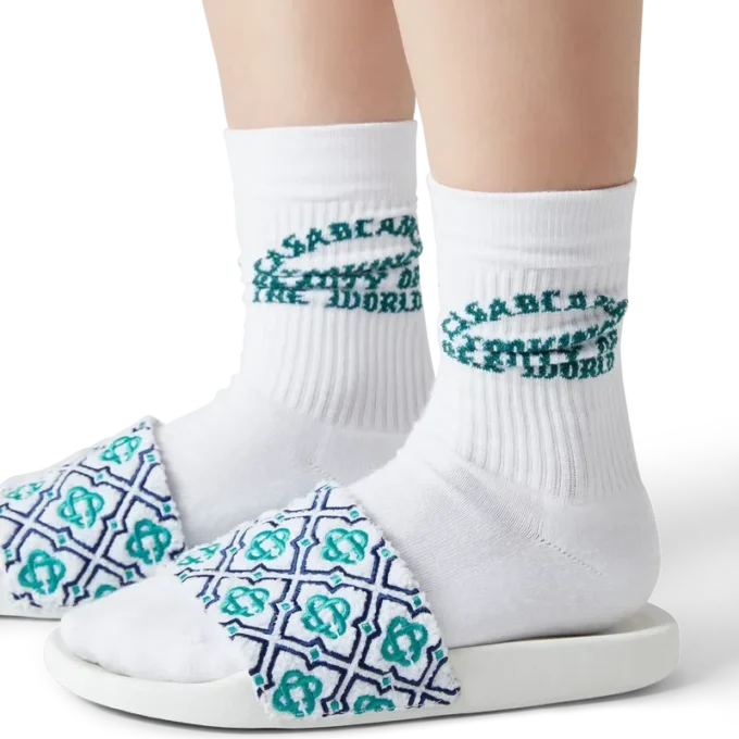 Monogram-frottéslippers for kvinner