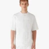 Oversized T-skjorte med korte shorts og applikert monogram