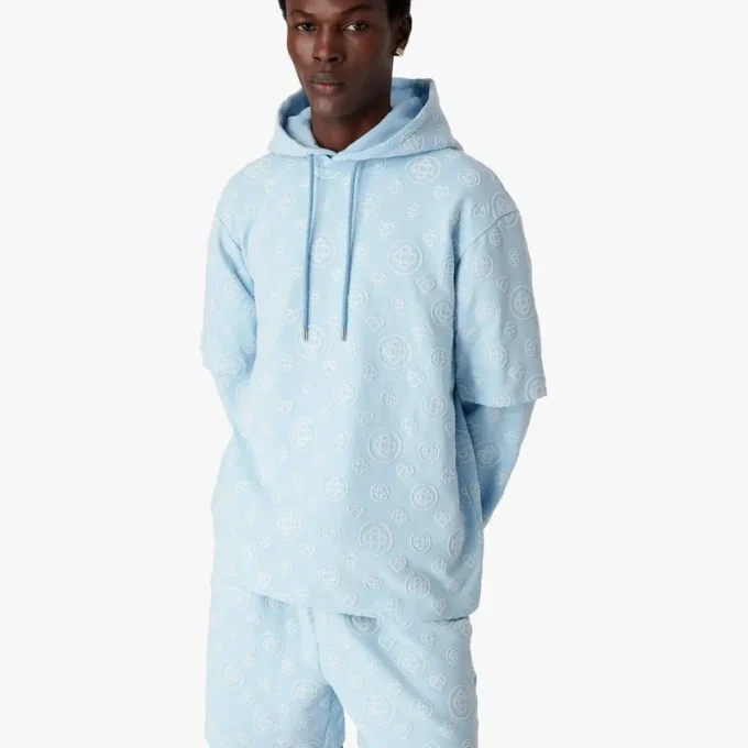Oversized T-skjorte med korte shorts og applikert monogram