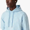 Oversized T-skjorte med korte shorts og applikert monogram