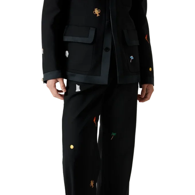 Skreddersydde bukser i ull med brodert motiv
