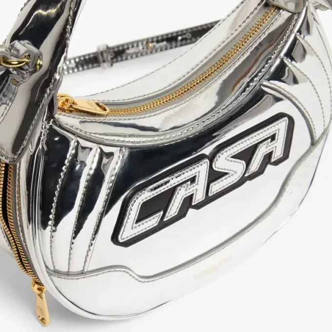 Sølvfarget biker-veske