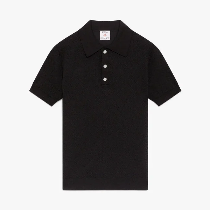 Svart kortærmet poloskjorte med monogram i pointelle