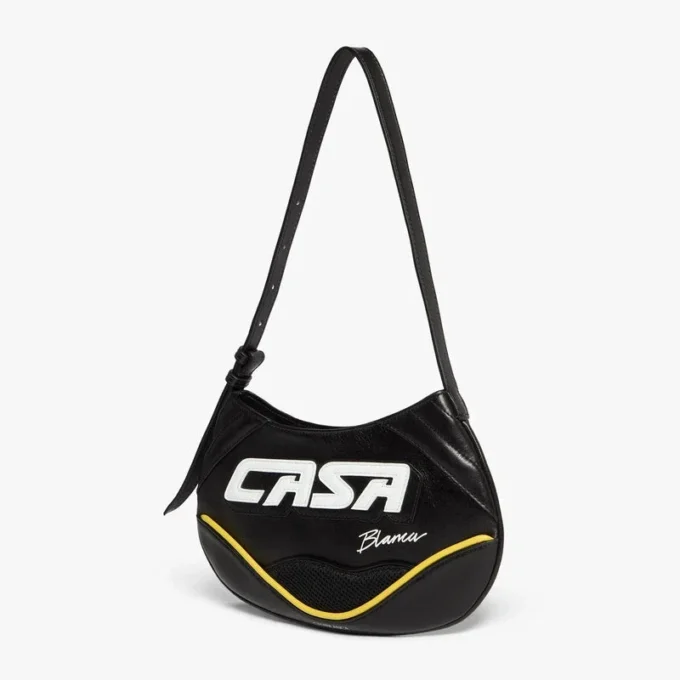 Svart, slank biker-veske