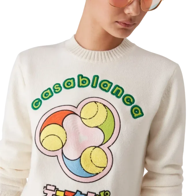 Tennisball-merinostrikk med rund hals