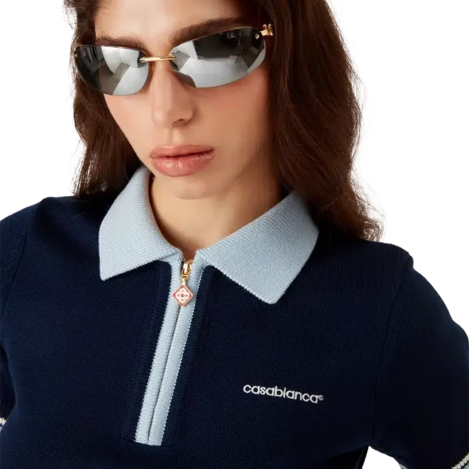 Tennispique-skjorte i merinostrikk Tennispique-skjorte i merinostrikk